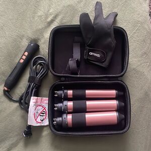 Amika “jack of all curls” interchangeable curl wand set.